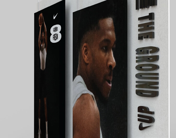 Nike Ermou FA26 Giannis Freak 8 install: giannis portrait wall against from the ground up.